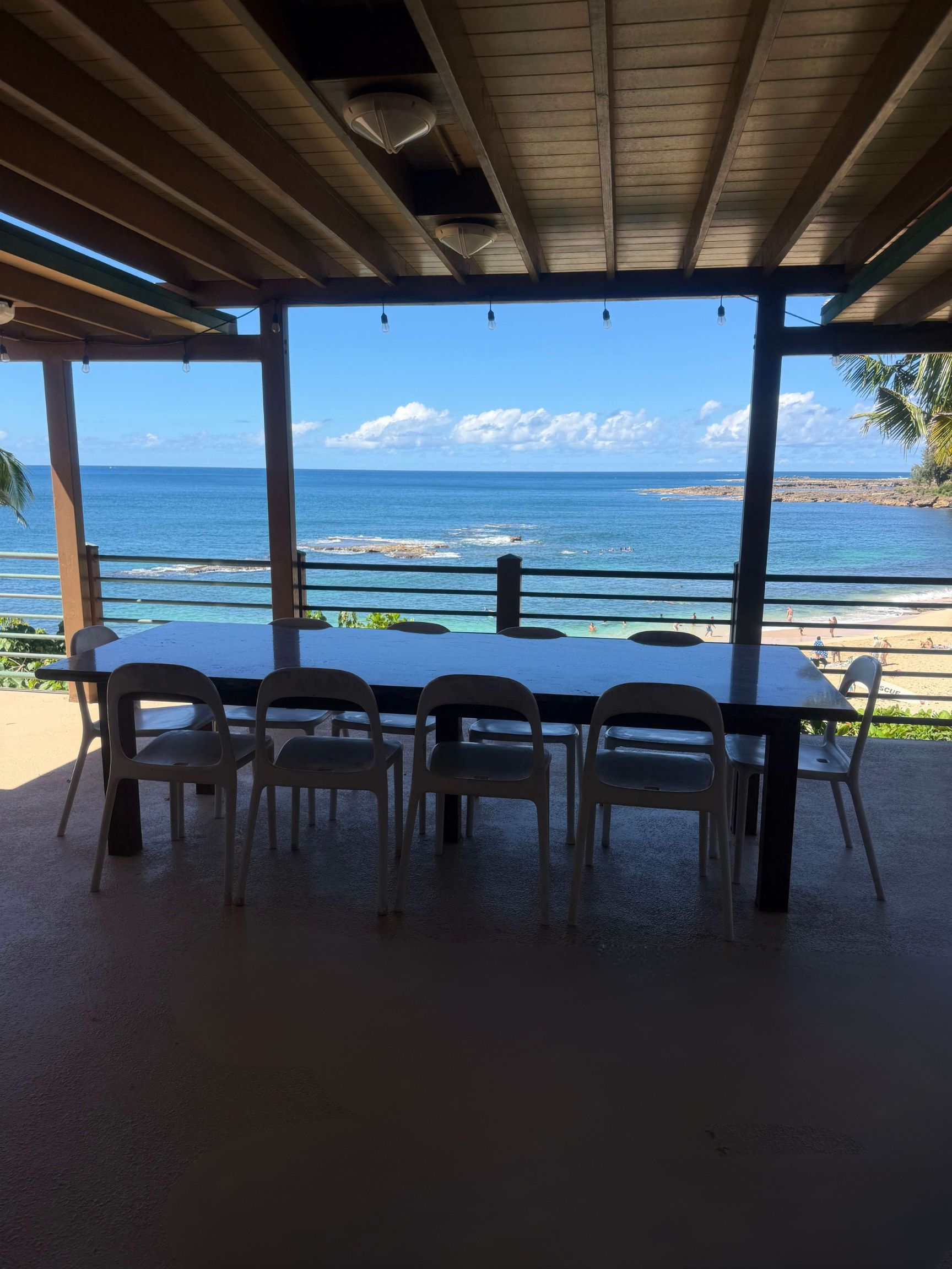 Dinner table on the balcony overlooking the ocean